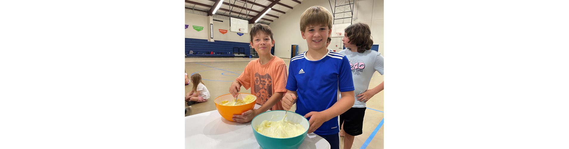 Shane F., West Feliciana Parks & Rec. camper, finishes up his how-fat smoothie in a bag during the Rethink Your Drink Program.